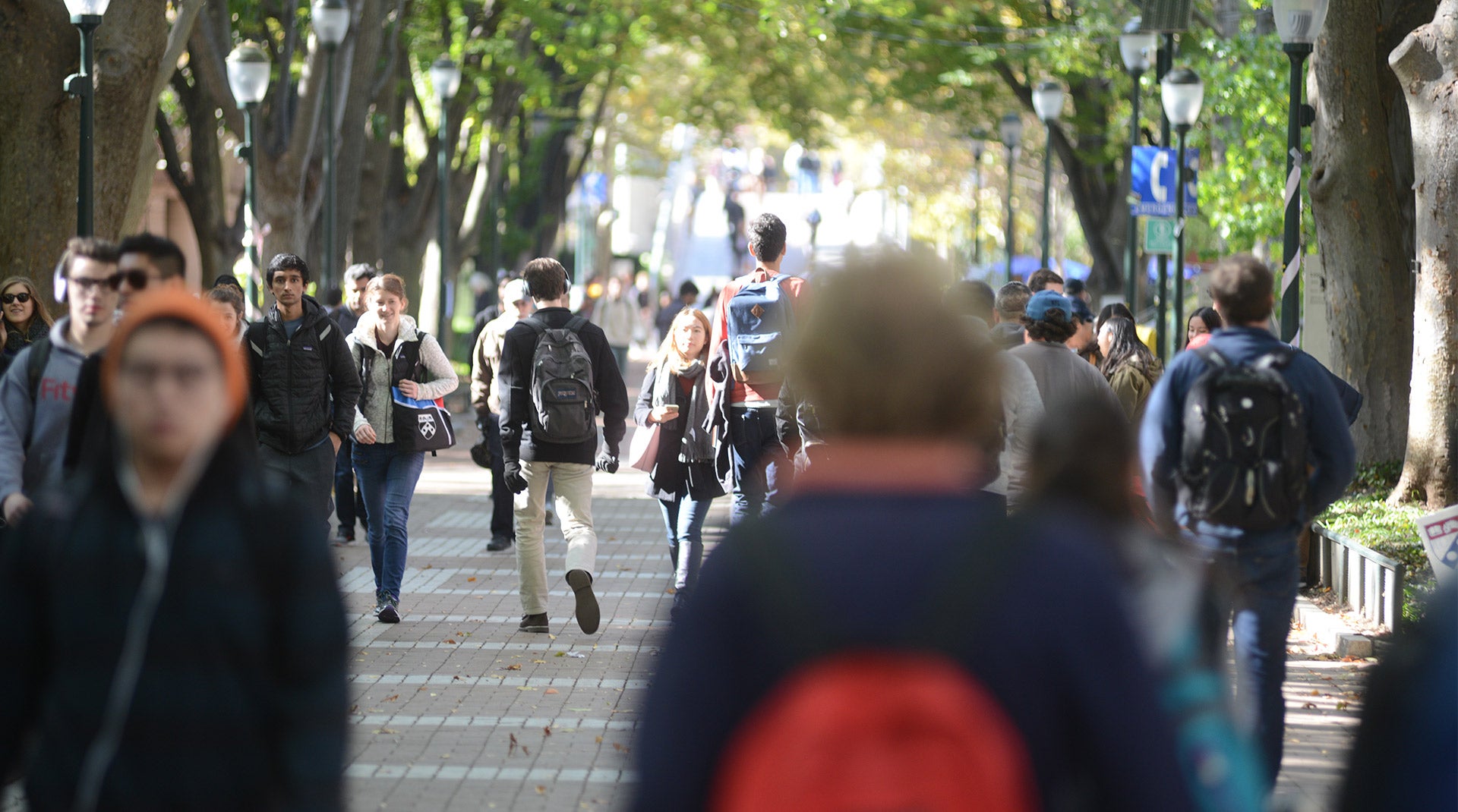 Students walking down Locust Walk on Penn campus